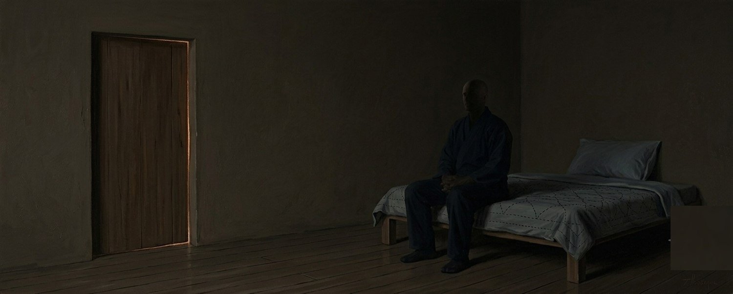 A painterly image of a dim room, a closed door edged with light, a figure sitting on a bed