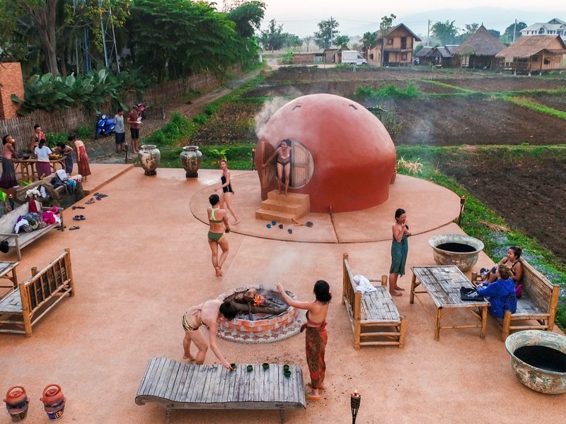 The herbal steam dome at Mala Dhara, set among the rice fields