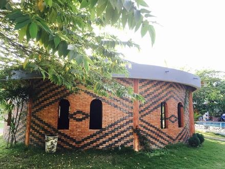 The Poolside Shala from outside, patterned brickwork