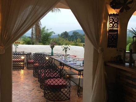 The open veranda set for dinner