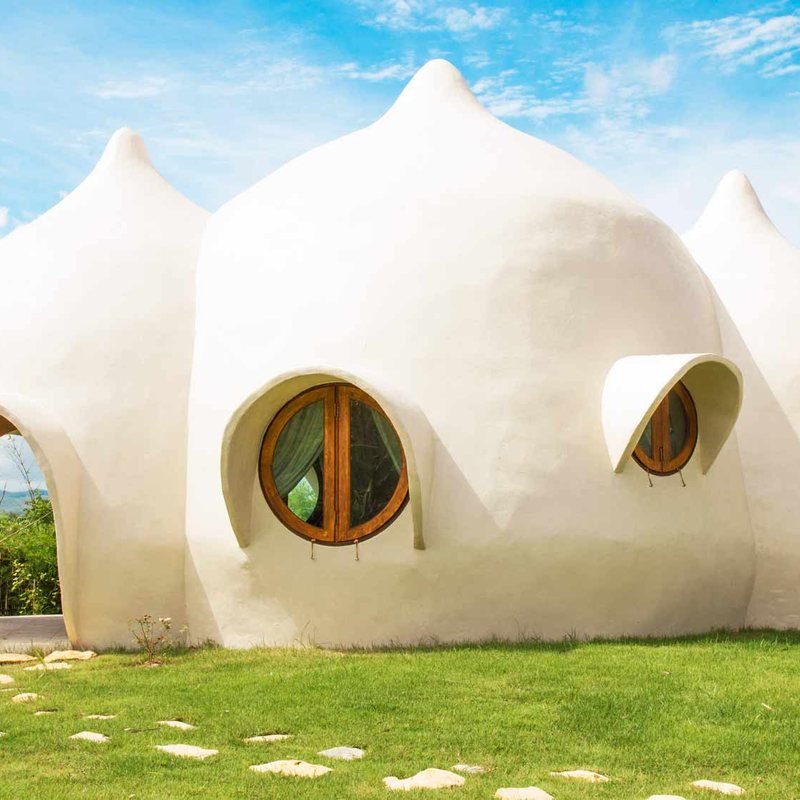 Raindrop Villa — three white domes with circular windows